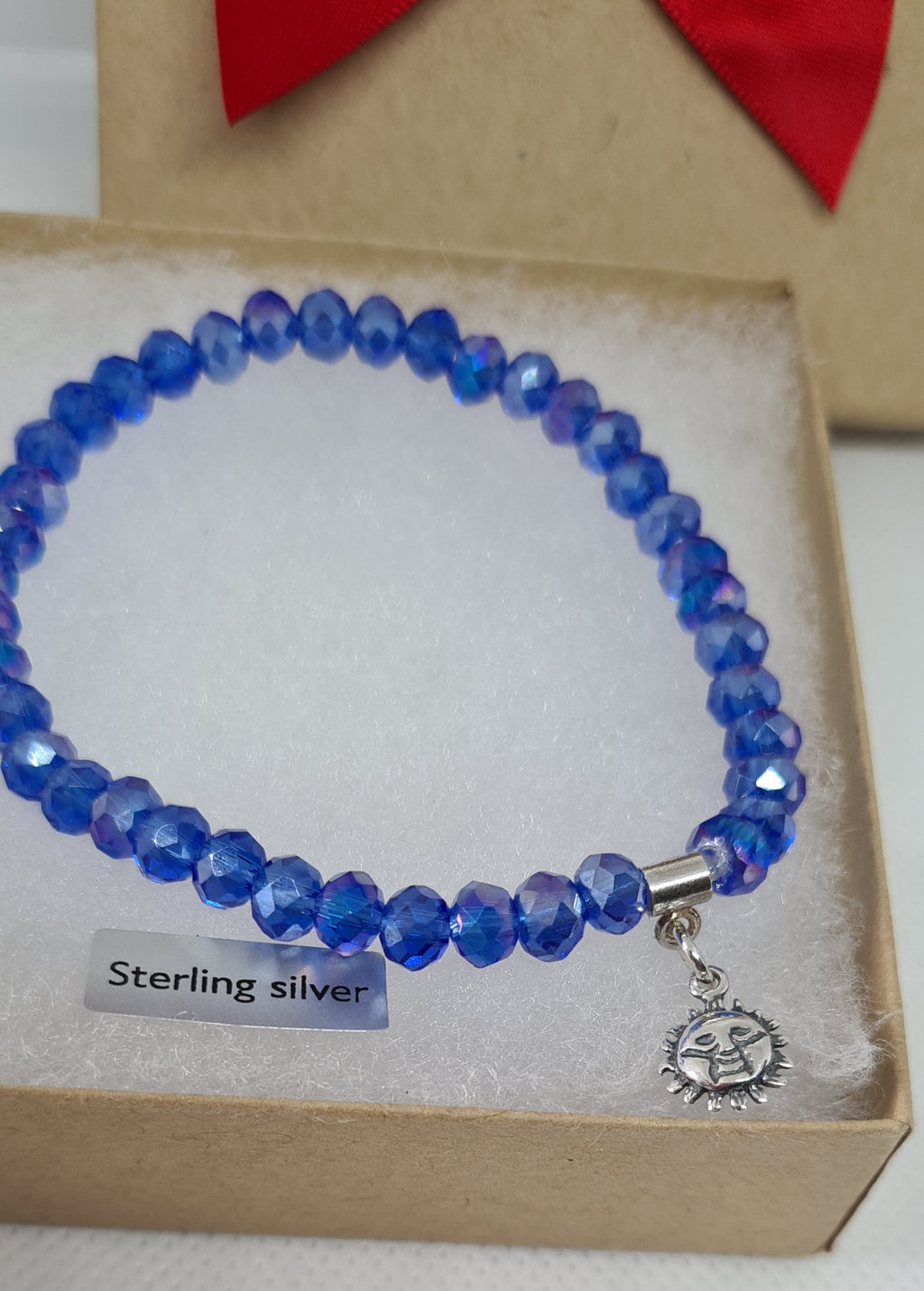 Blue Bead Bracelet with Sun Charm