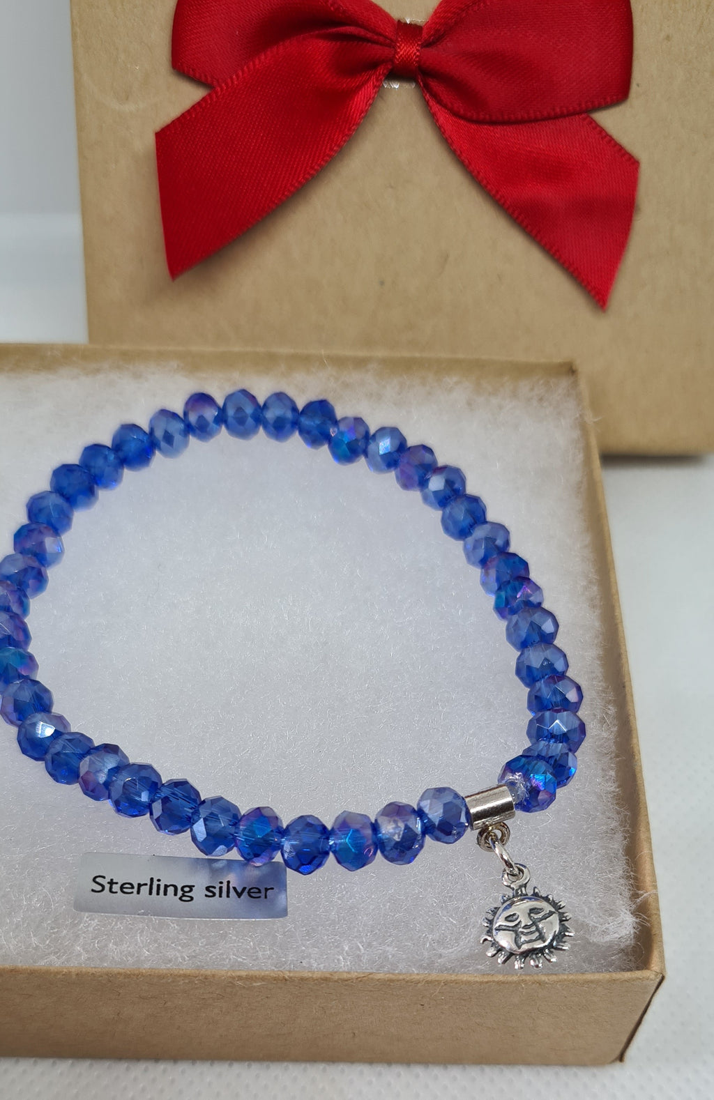 Blue Bead Bracelet with Sun Charm